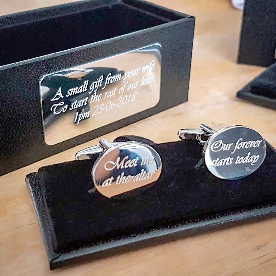 Personalised engraved oval cufflinks in a sleek black box, perfect for weddings, birthdays, and corporate events.