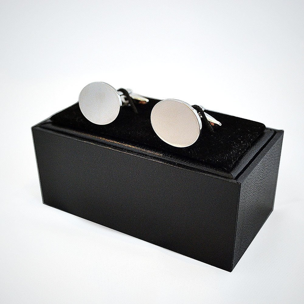 Personalised engraved oval cufflinks in a sleek black box, perfect for weddings, birthdays, and corporate events.