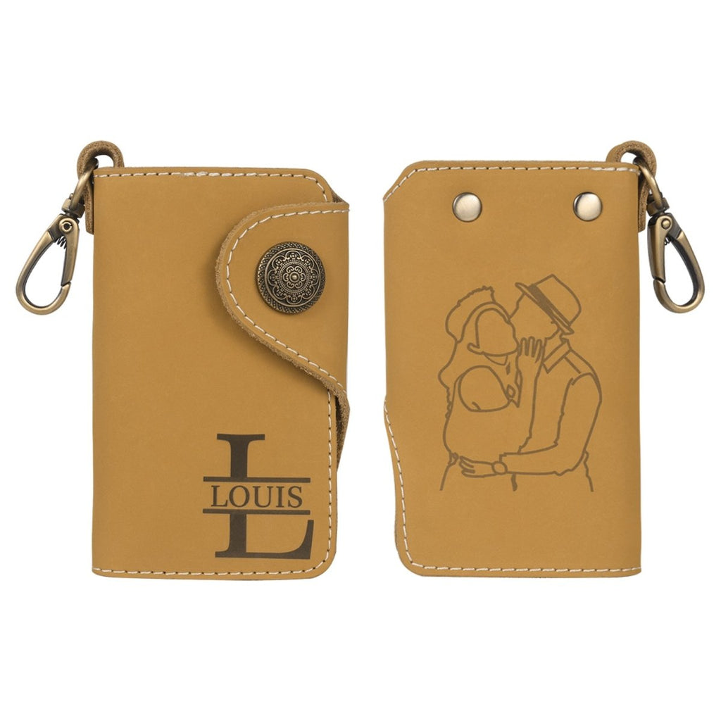 Personalised leather key holder (11.5cm x 7.2cm) with engraved initial and custom line art from your photo.
