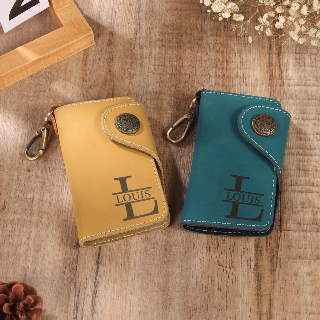 Personalised leather key holder (11.5cm x 7.2cm) with engraved initial and custom line art from your photo.
