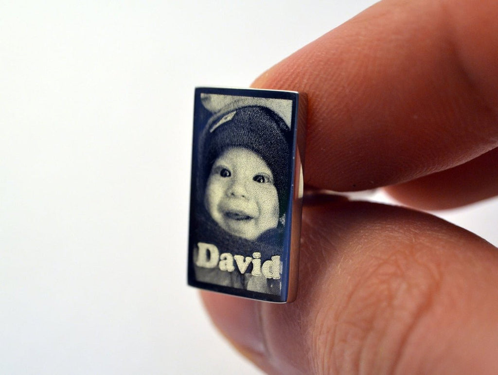 Stylish engraved cufflinks in a chrome case, perfect for weddings, anniversaries, or corporate events with free engraving offered.
