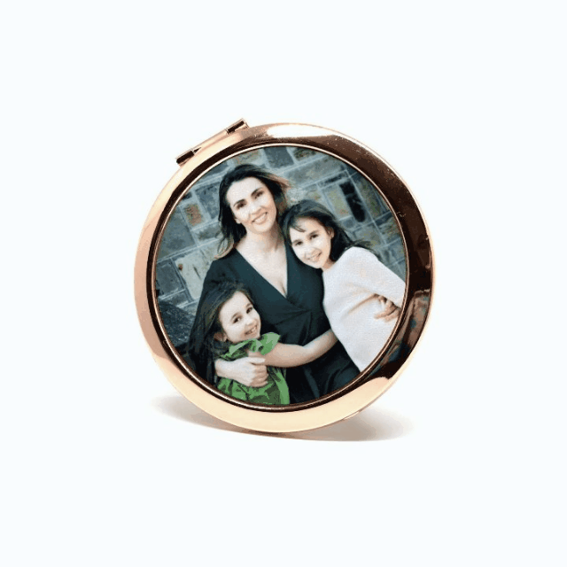 Personalized rose gold compact mirror with custom photo and text engraving, perfect Mother's Day gift.