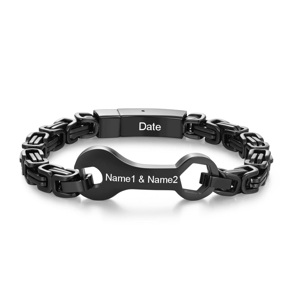 Personalised black stainless steel wrench bracelet (22cm), custom engraved with names & date— a perfect dad gift.
