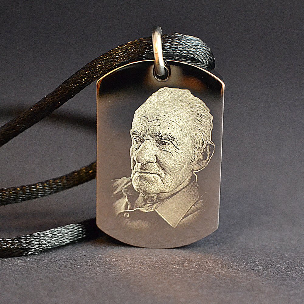 Personalised steel dog tag pendant for cremation ashes, hypoallergenic, engravable, a heartfelt memorial keepsake.