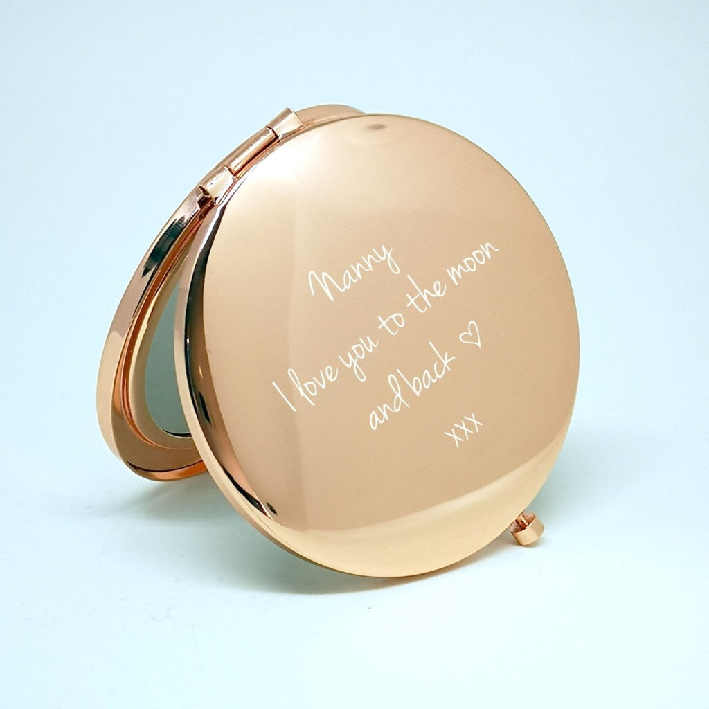 Personalized rose gold compact mirror with custom photo and text engraving, perfect Mother's Day gift.