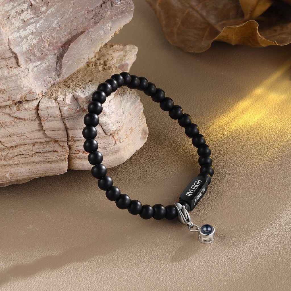 Personalised photo projection bracelet (16cm) with name bar—elegant, meaningful, and perfect for gifting.