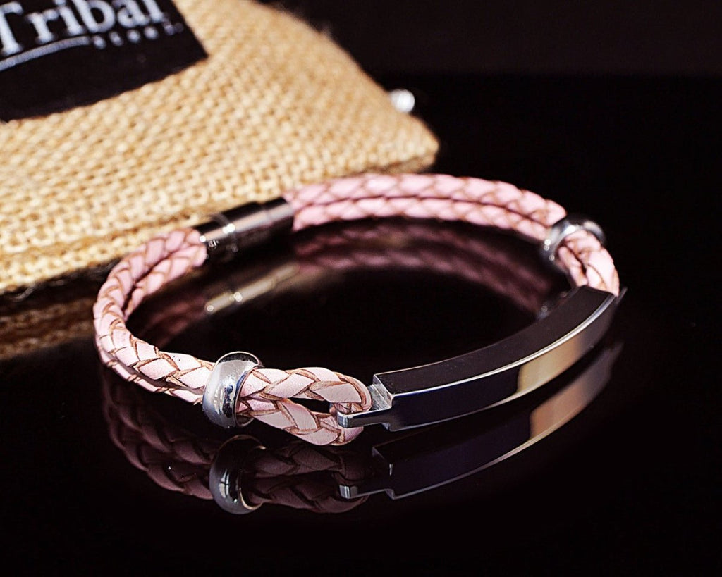 Stylish pink leather bracelet with a polished ID plate for engraving names or messages, ideal for thoughtful gifts.