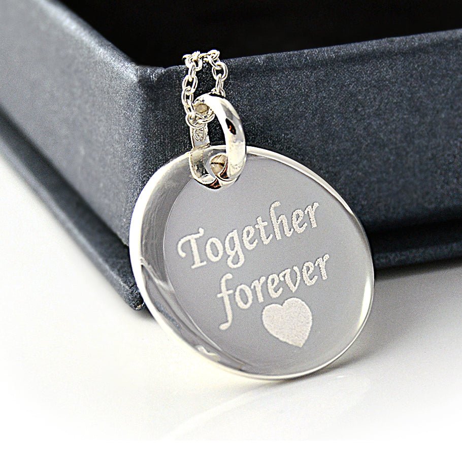 Round sterling silver pendant necklace, personalized with photo and text, perfect for pet memorials or sentimental gifts.