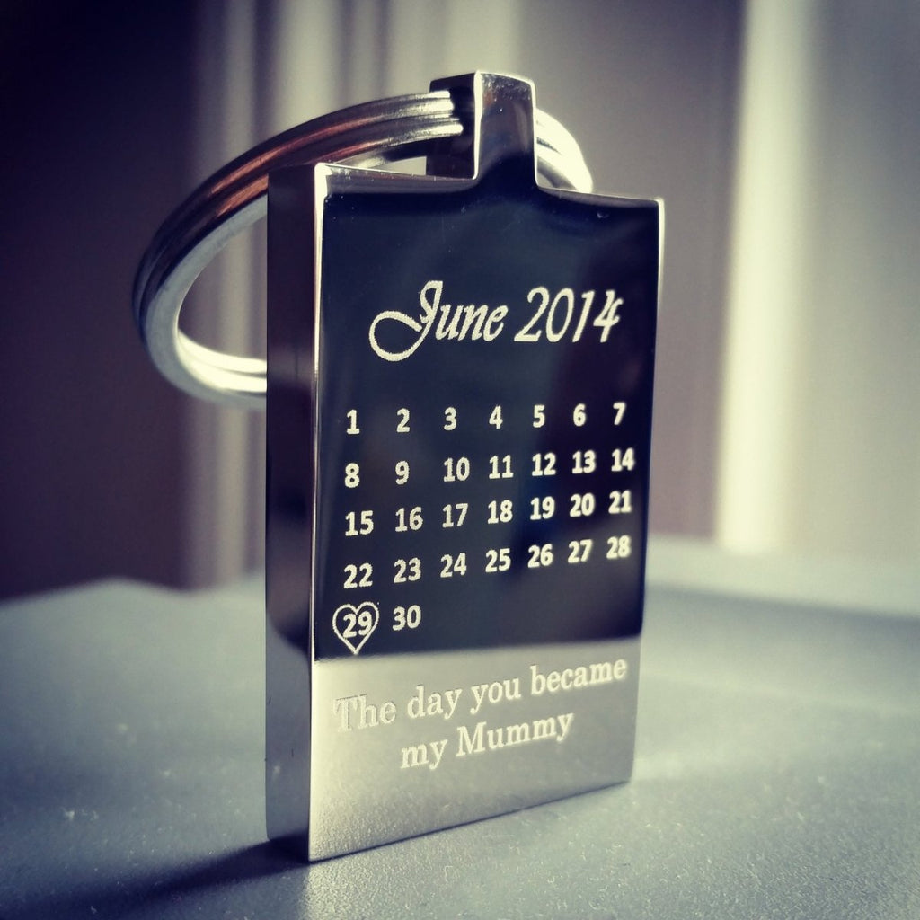 Personalized stainless steel calendar keyring with engraved special date, message, and photo.