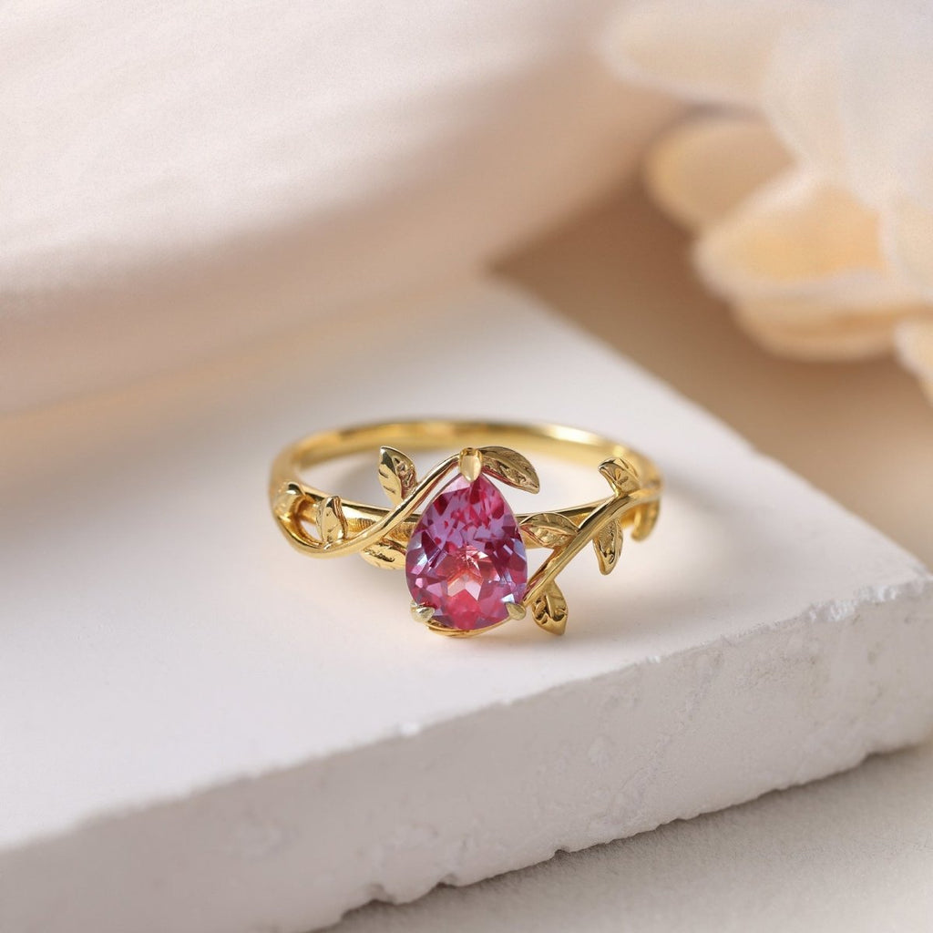 Handcrafted 925 sterling silver ring featuring a genuine Alexandrite gemstone, available in white gold, gold, or rose gold plating.