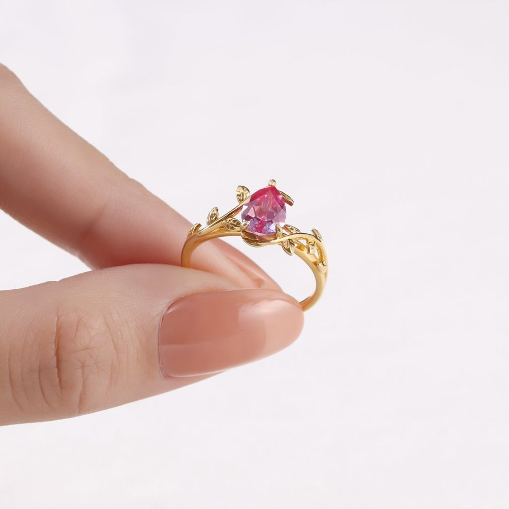 Handcrafted 925 sterling silver ring featuring a genuine Alexandrite gemstone, available in white gold, gold, or rose gold plating.